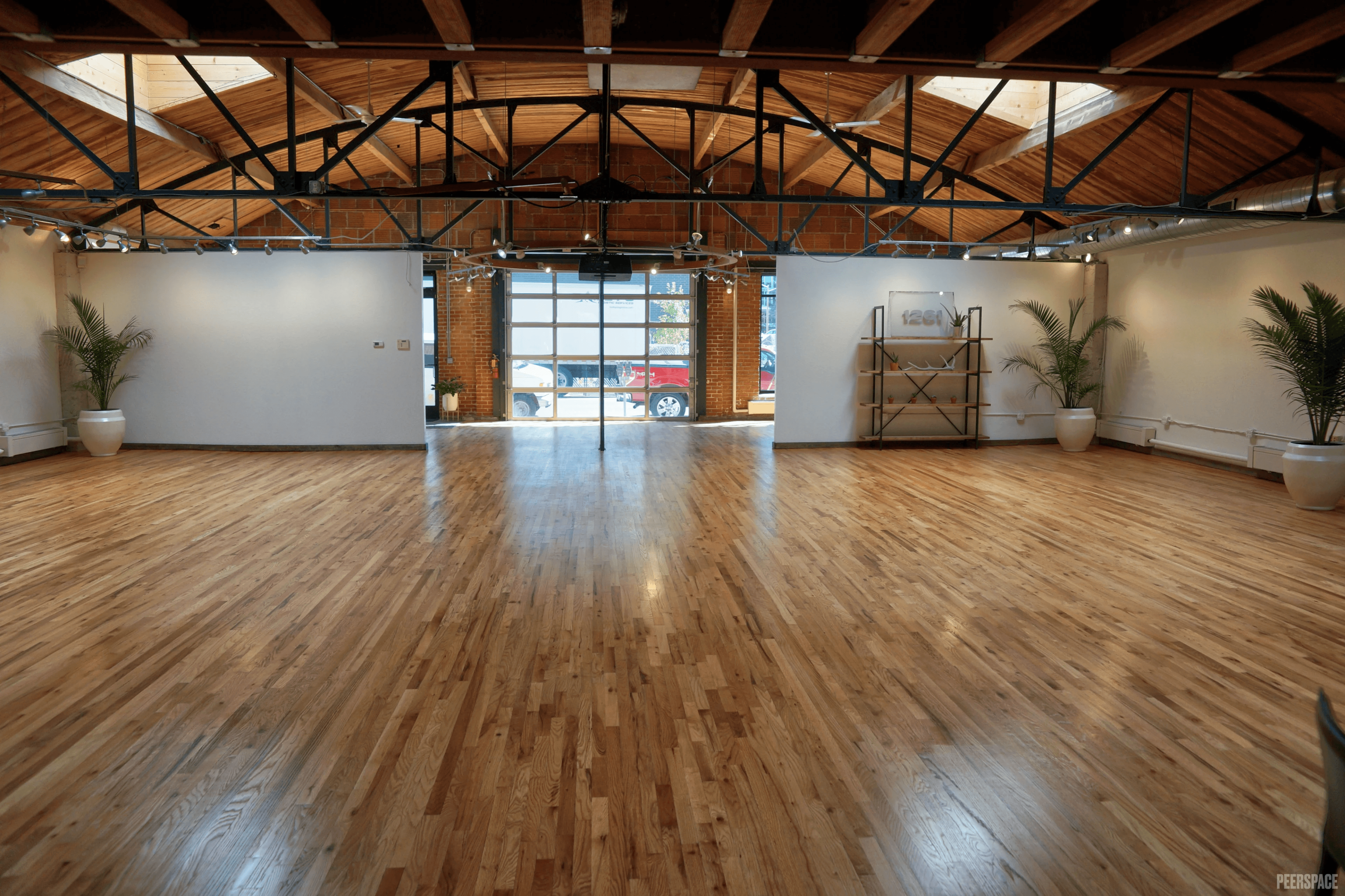 The main floor at Sterling Event Space, looking toward the restored garage door entrance